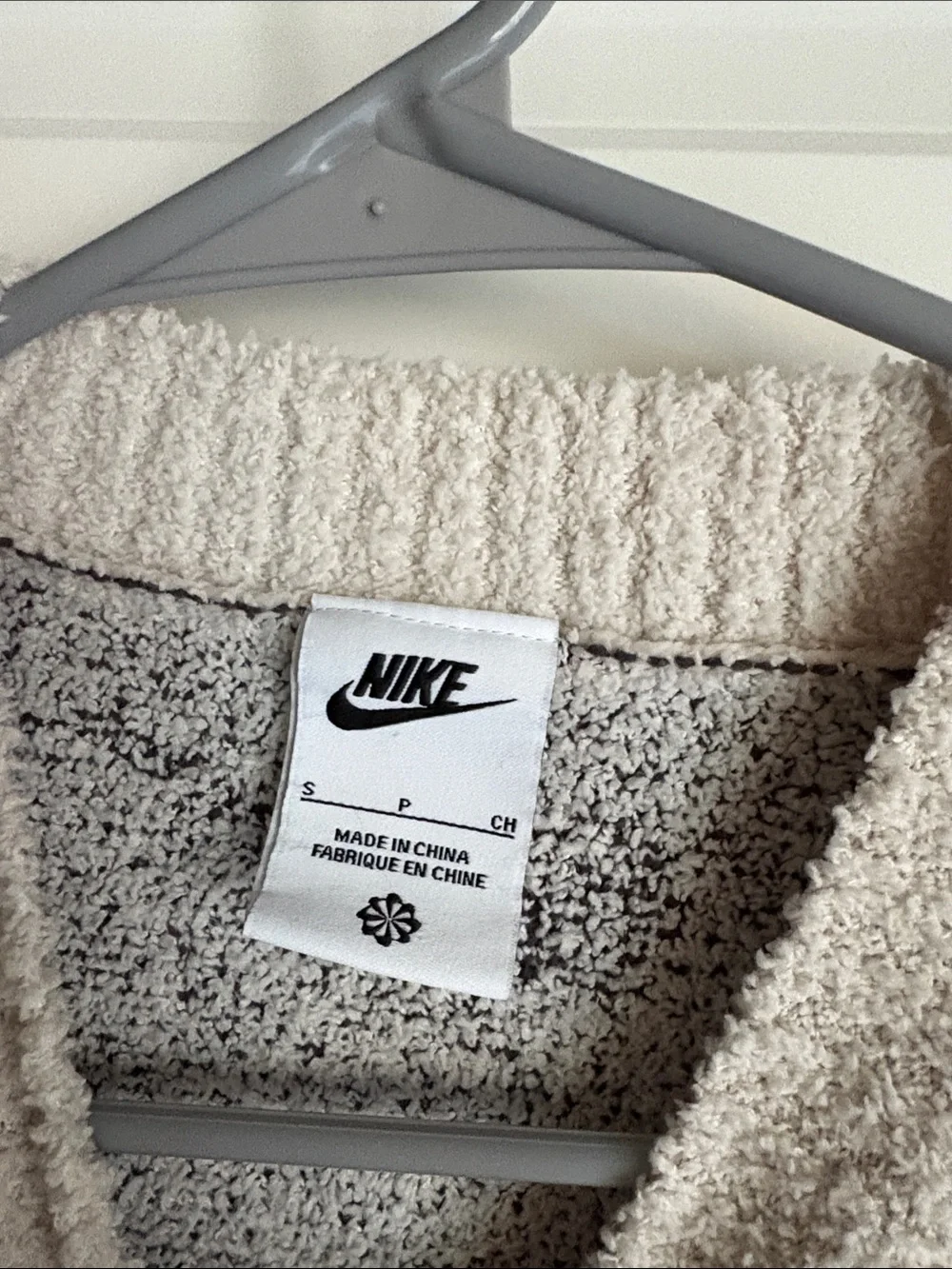 Nike Cream Short-Sleeve Fuzzy Sweater with Black Swoosh Motif